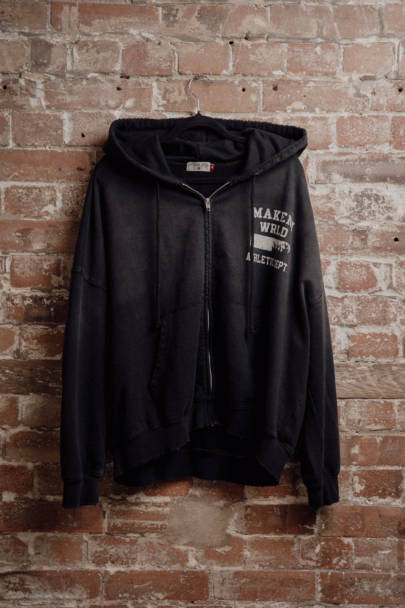 black sunfade athletic department zip up