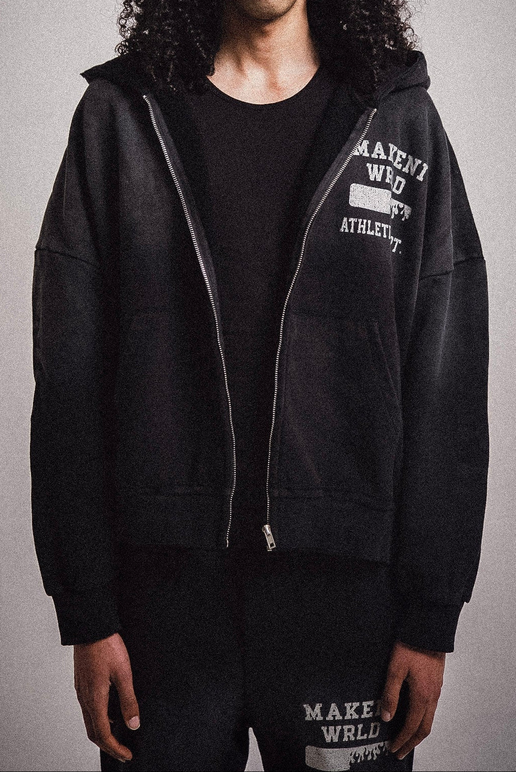 black sunfade athletic department zip up