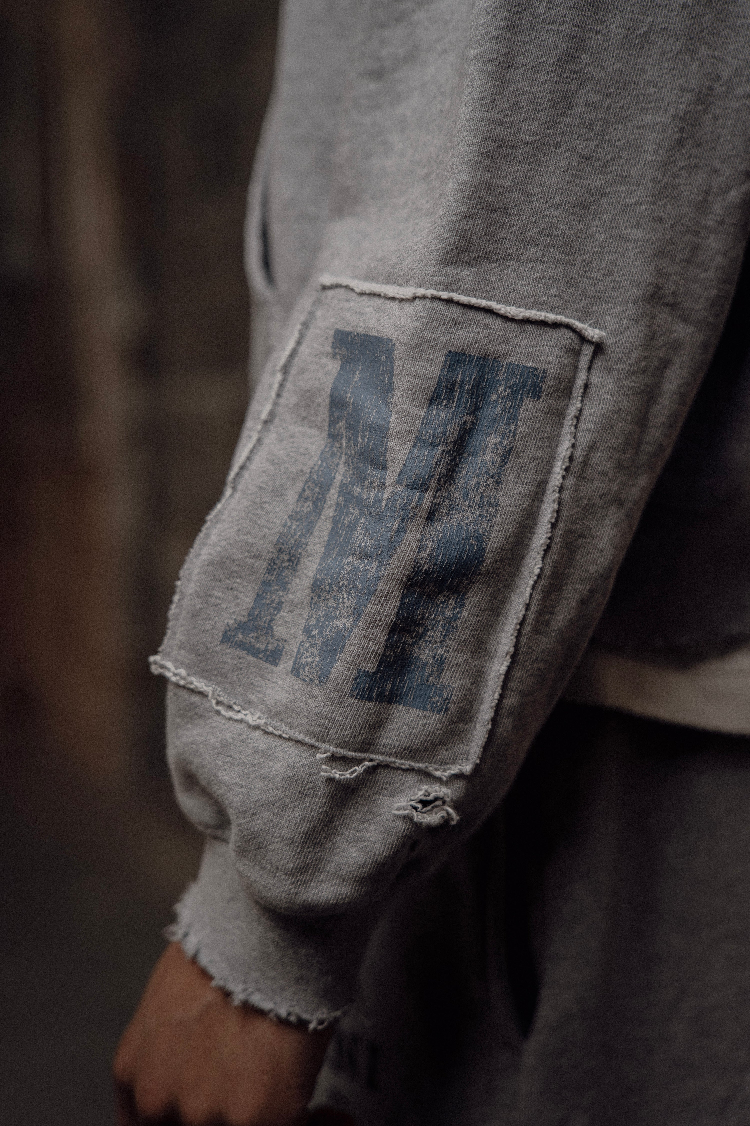 grey patchwork athletic department pullover