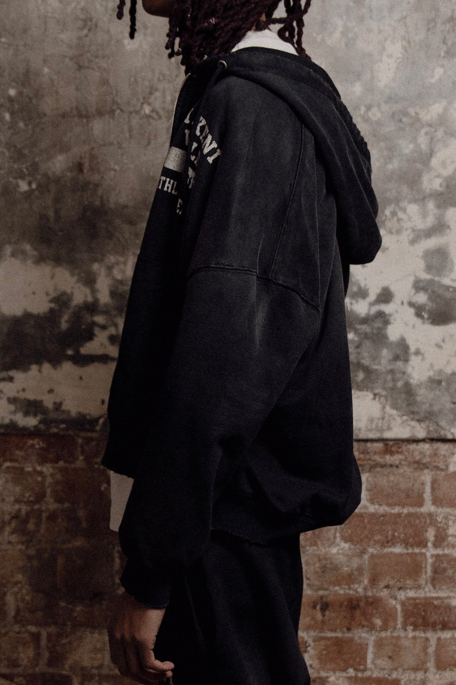 black sunfade athletic department zip up