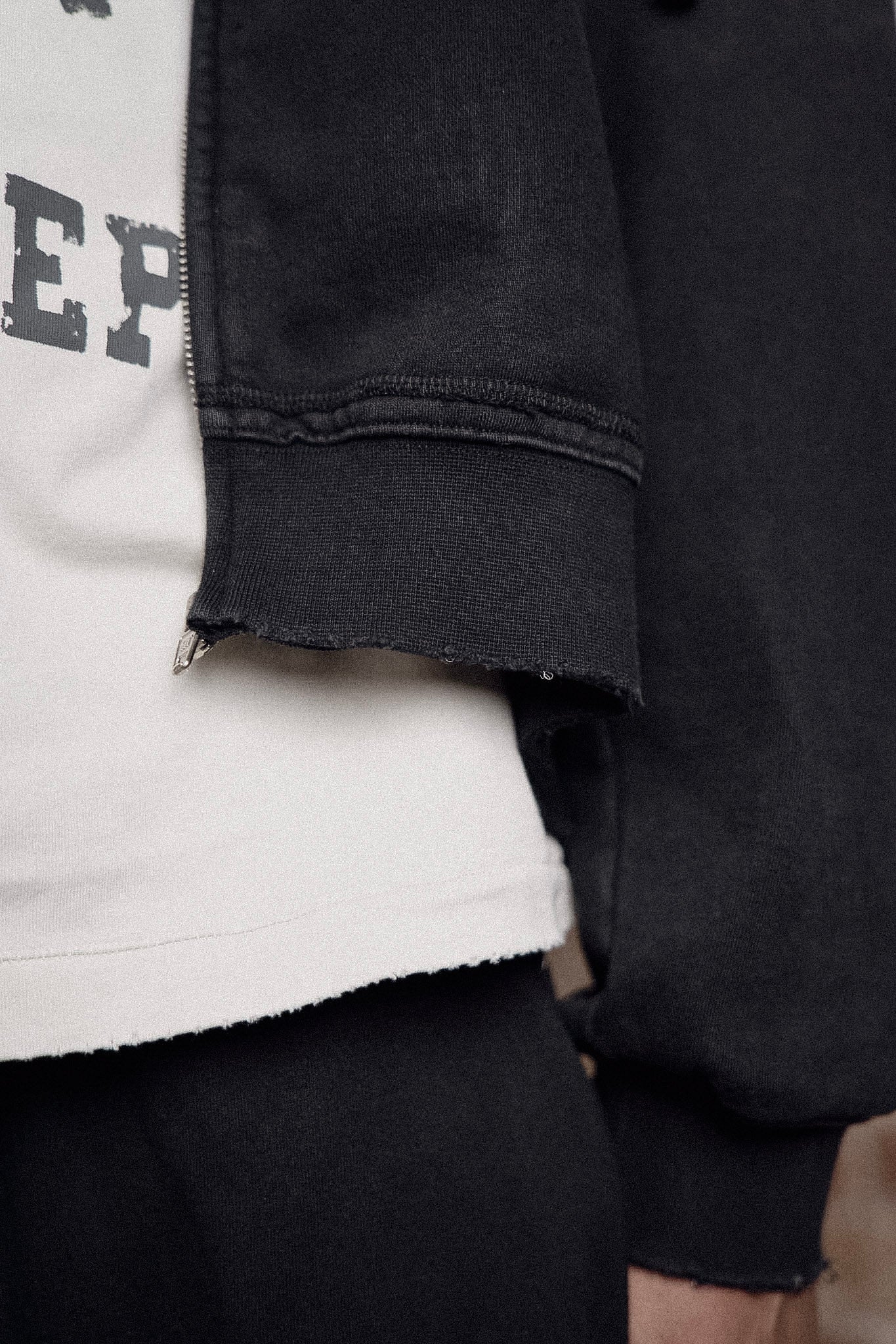 black sunfade athletic department zip up
